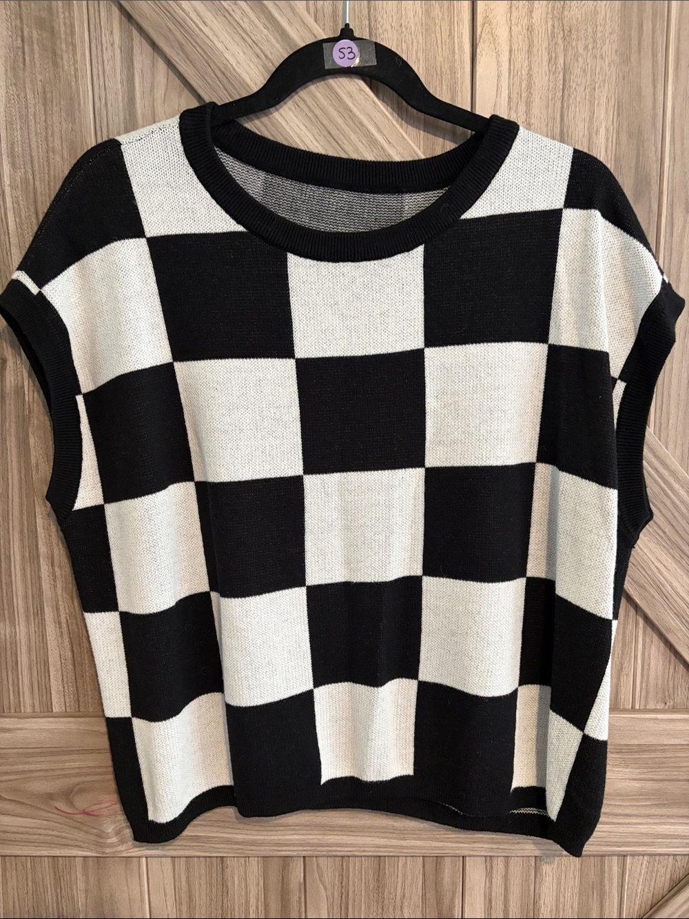 Classic Black and White Checkered Sleeveless Knit Top